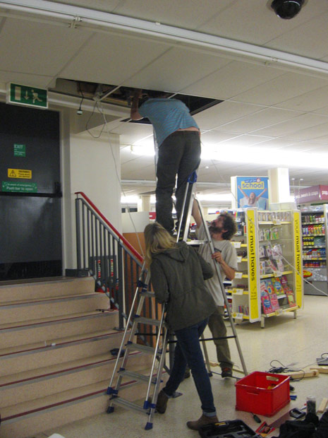 Ladders being installed: Tom Keene installing the wobbly mechanism for the ladders with Kyp and Suzie 'helping'.